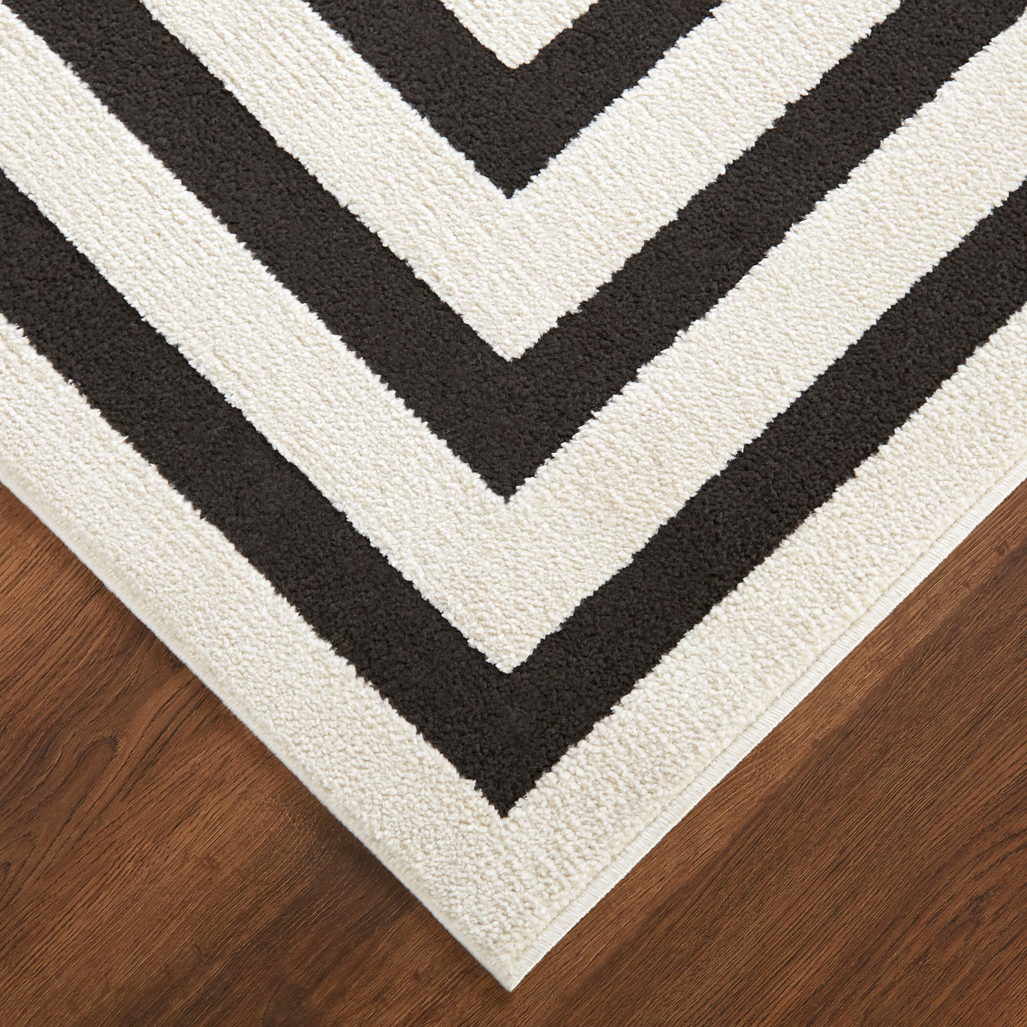 Optika 114 X 79 inch Black/White Rug in 6 x 9