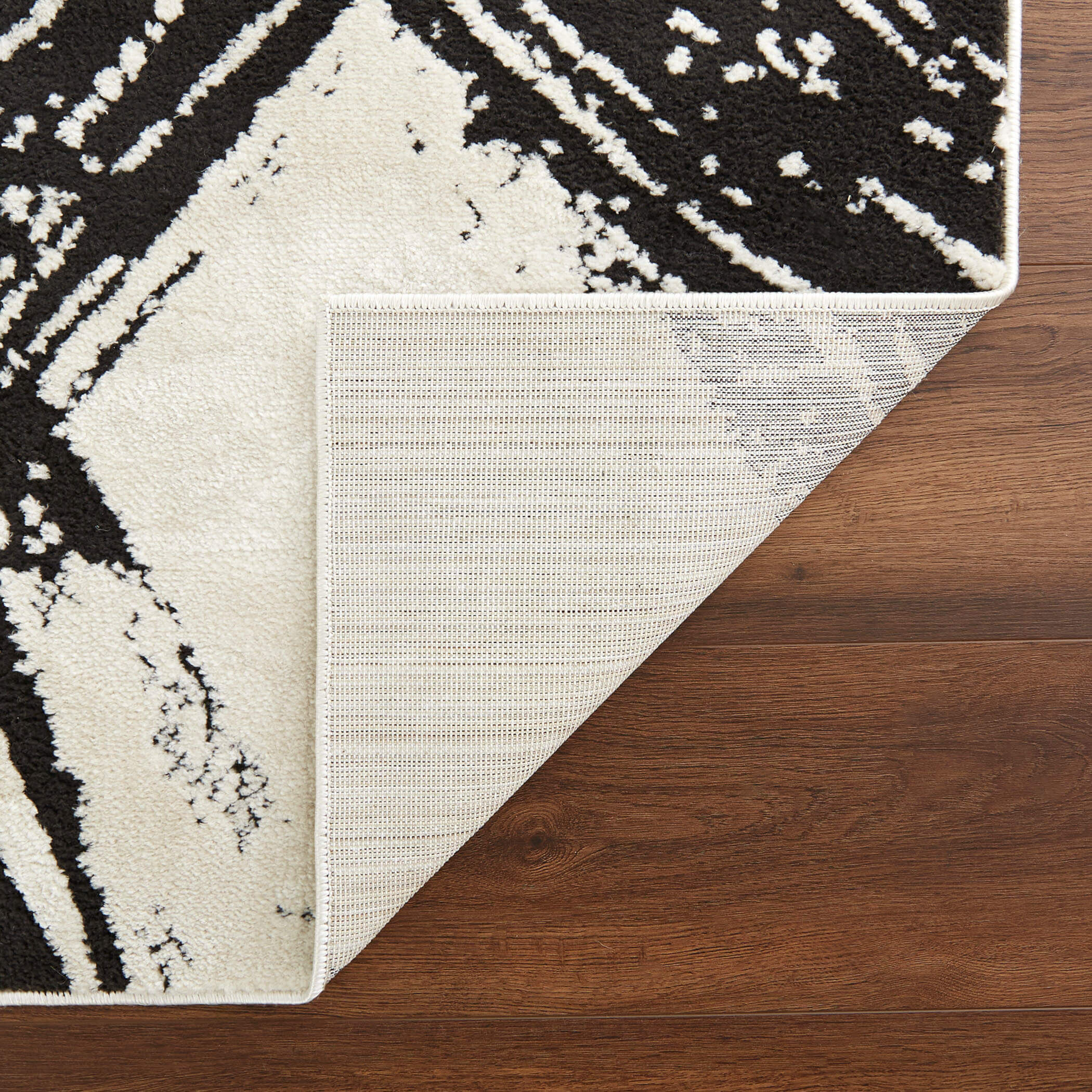 Optika 130 X 94 inch Black/White Rug in 8 x 11