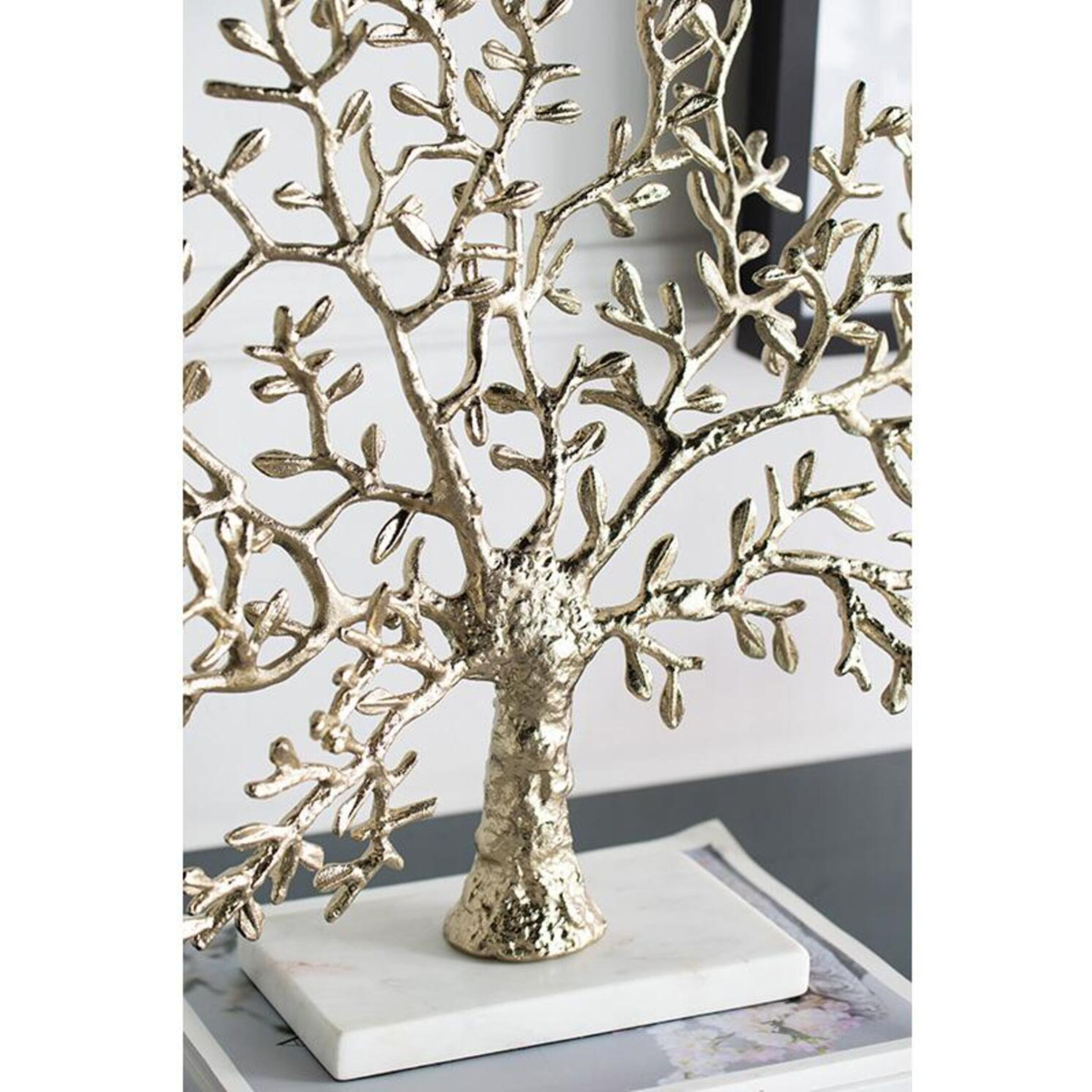 Anita Gold Finished Aluminum with White Marble Base Décor